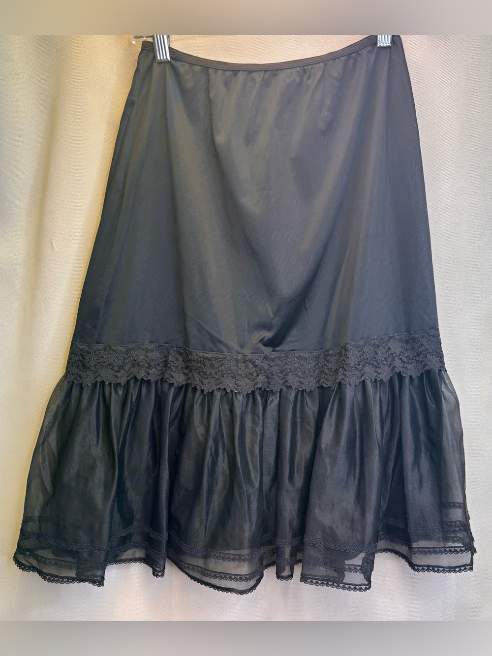 Vintage 60s black nylon ruffled hem half slip with sheer black lace trim lined